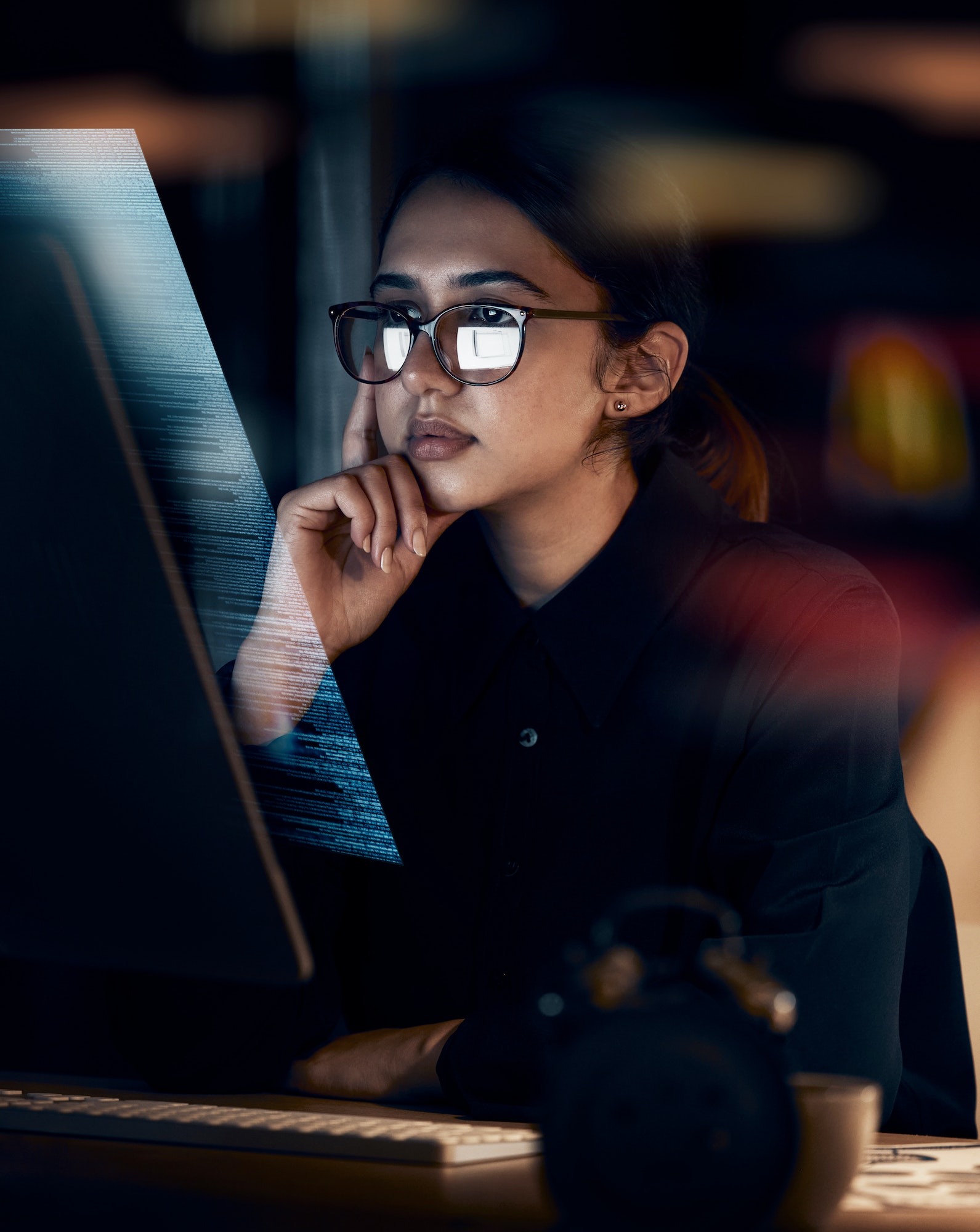 programming-cybersecurity-and-thinking-with-woman-at-computer-for-software-idea-and-coding-at-nig.jpg